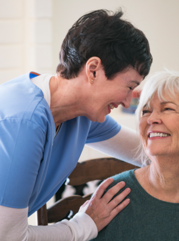  Nurse taking care of elderly lady